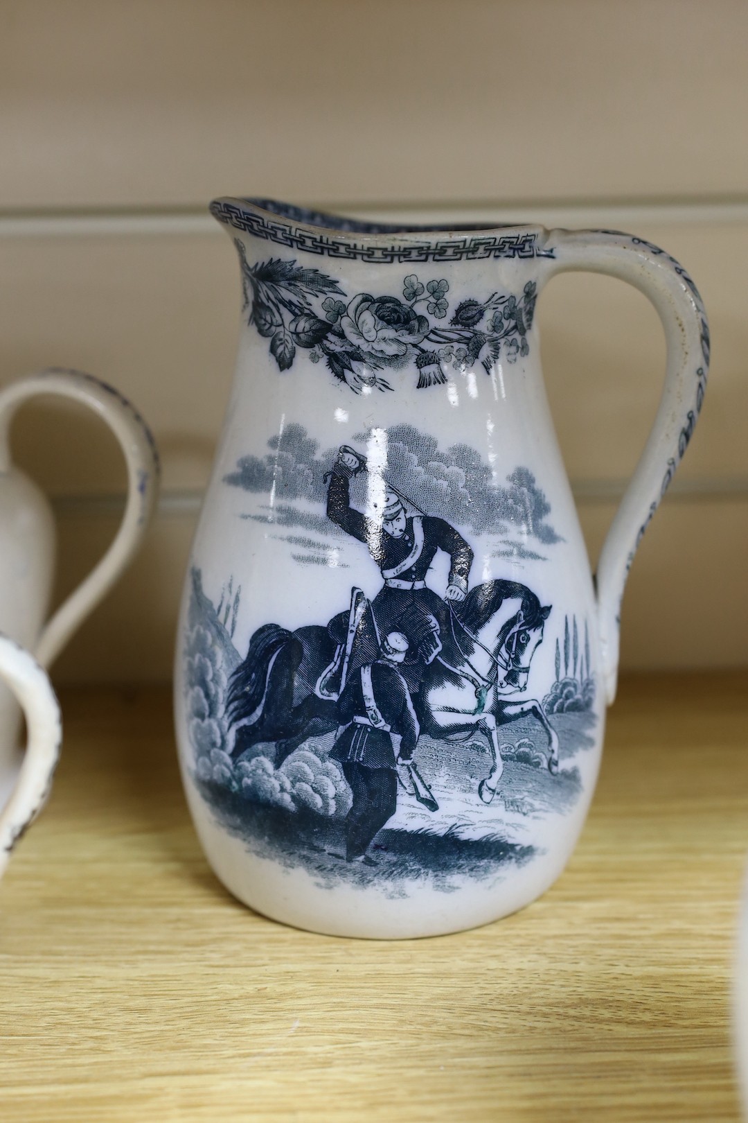 A group of mid 19th century Staffordshire British rifle volunteers and rifle target practice commemorative ceramics